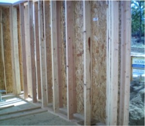 Double wall construction in a net zero energy home building